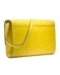 Yellow printed leather clutch bag